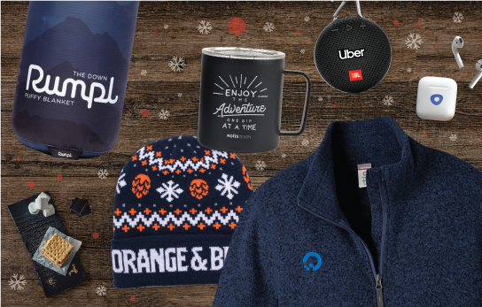 Holiday gift kit with festive beanie, jacket, stainless steel mugs, airpods, and bluetooth speaker.