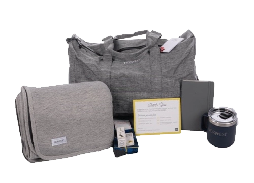 Norwest spring/summer kit with marine layer fleece blanket and other branded swag.
