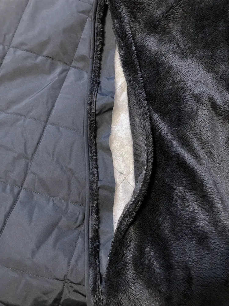 Open Eddie Bauer blanket with easy embroidery access.