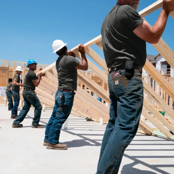 Construction men working in Carharrt jeans